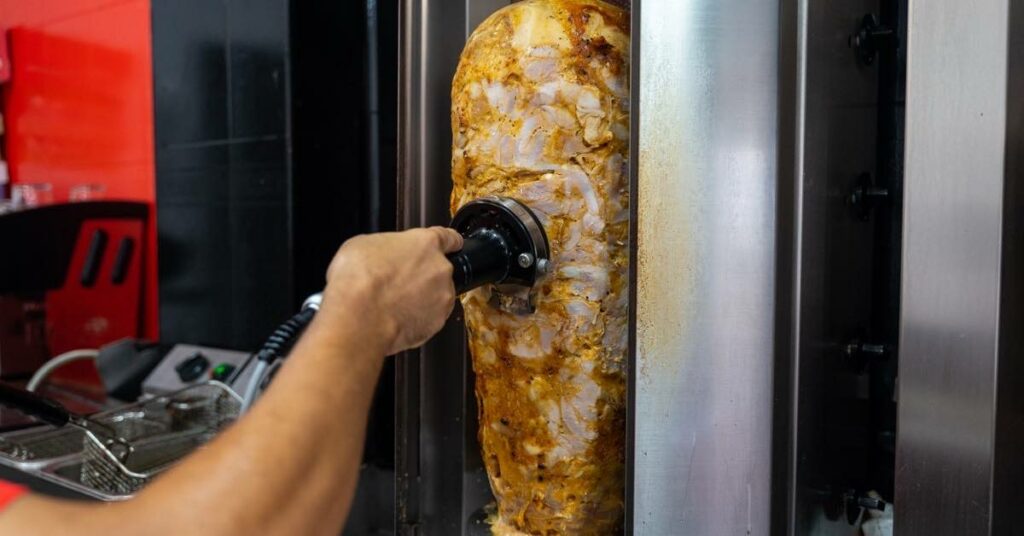 Cutting Doner Meat for Kebab