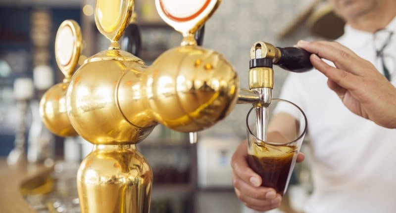 Pouring Beer Into Beer Glass